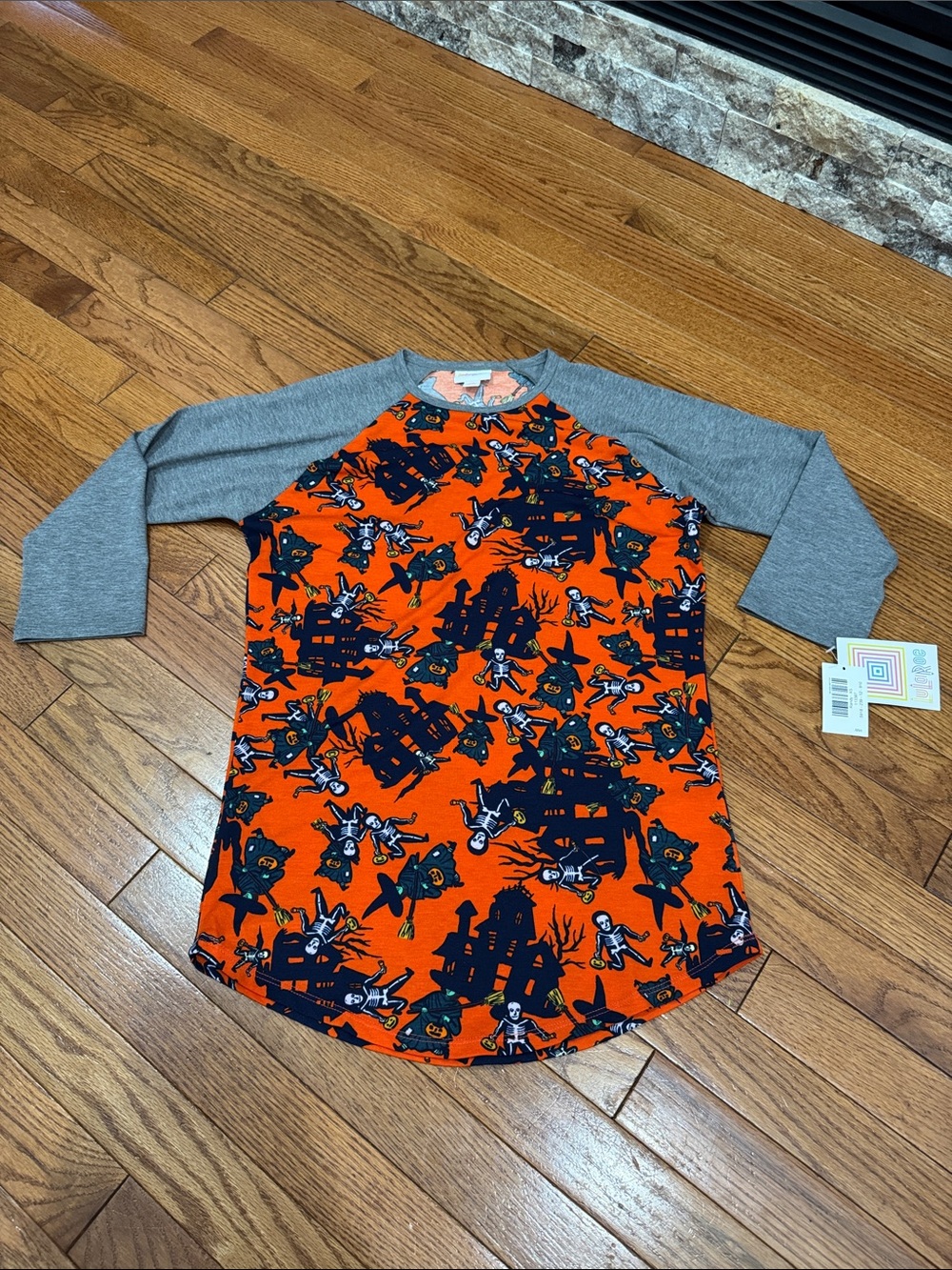 LuLaRoe Orange Halloween Print Raglan Top with Gray Trim